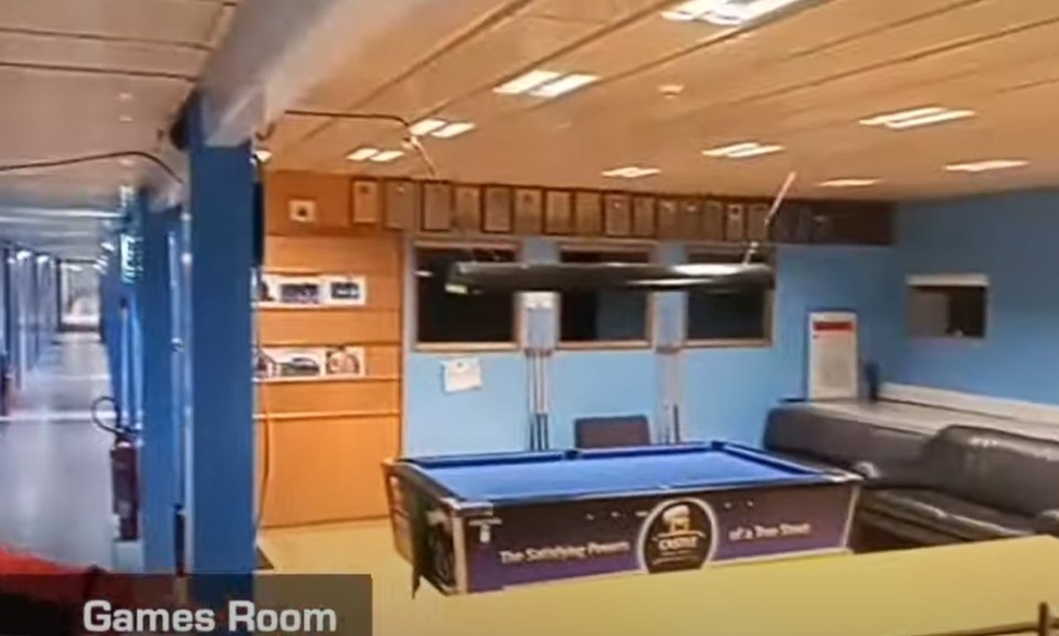 Games room with pool table.