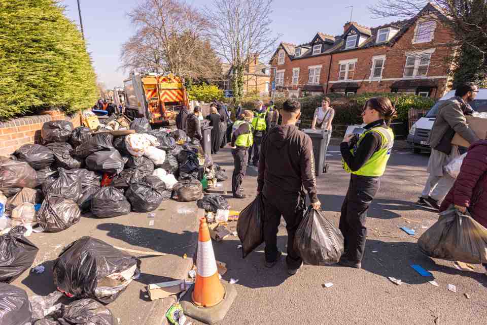 Residents overflowing waste bins during a refuse collectors' strike.