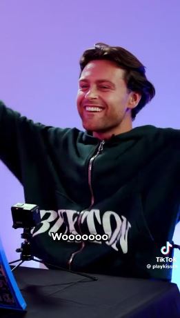 Love Island star Omar reacting enthusiastically.