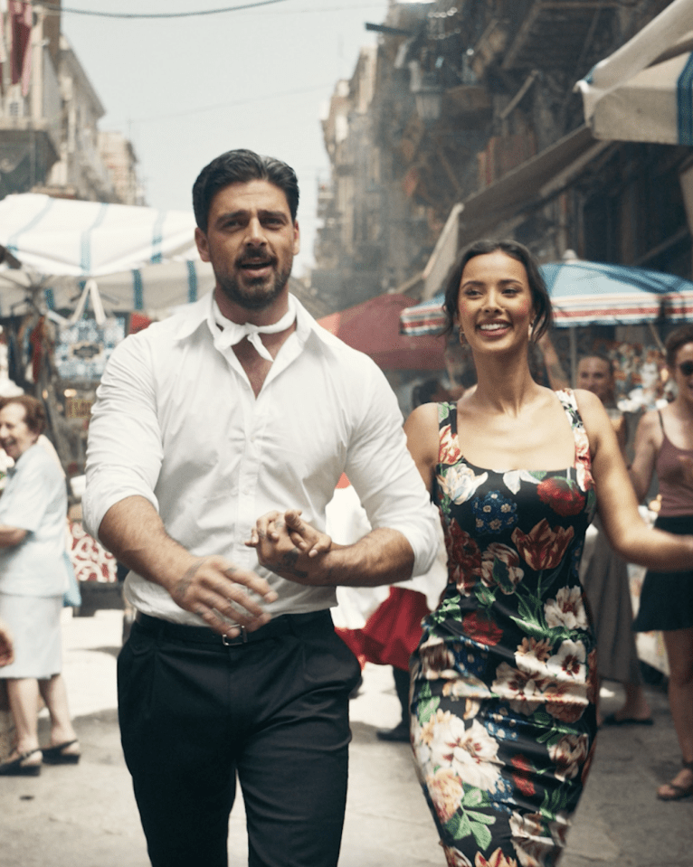 Maya Jama and Michele Morrone in Dolce & Gabbana's Devotion men's fragrance campaign.
