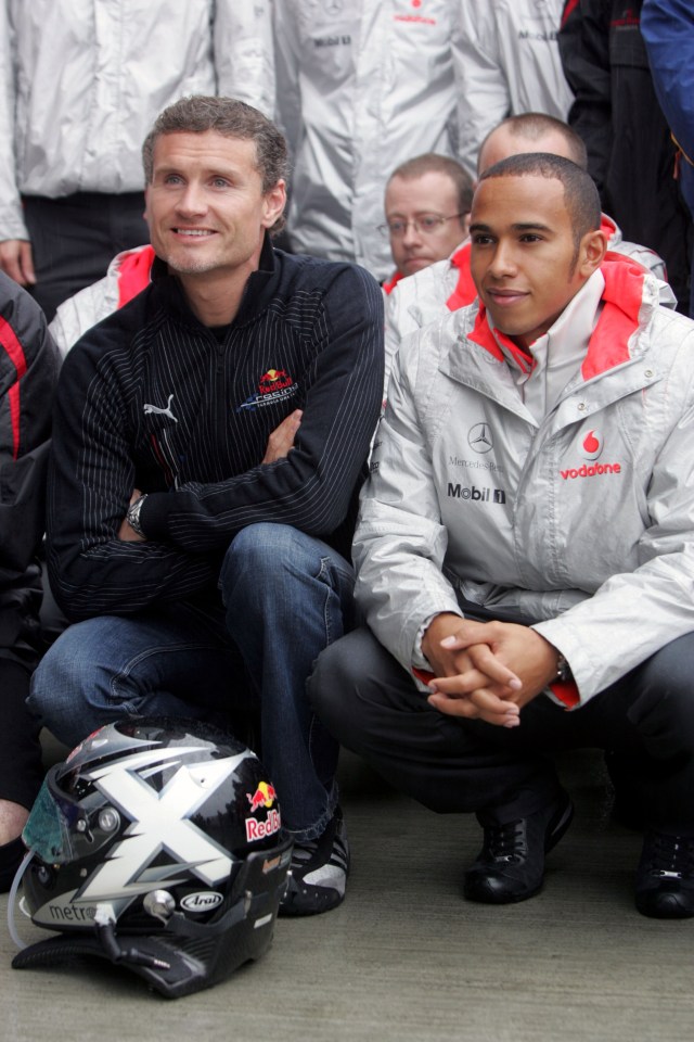 David Coulthard and Lewis Hamilton at a photo opportunity.