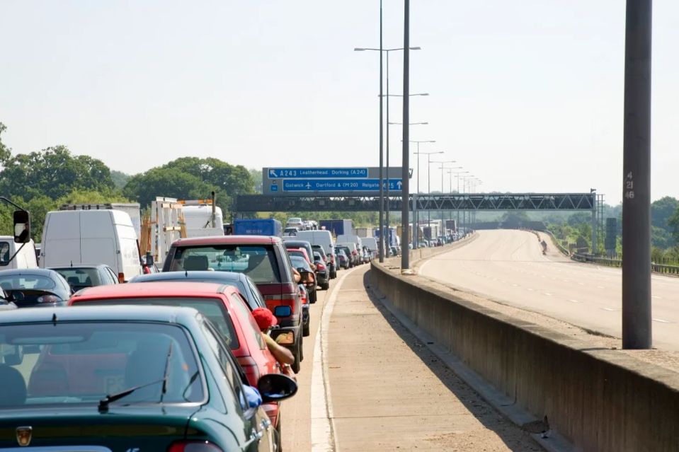 An image collage containing 1 images, Image 1 shows Traffic jam on the M25 motorway near junction 9