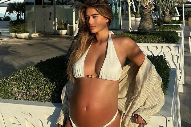 An image collage containing 1 images, Image 1 shows Pregnant woman in white bikini by the beach