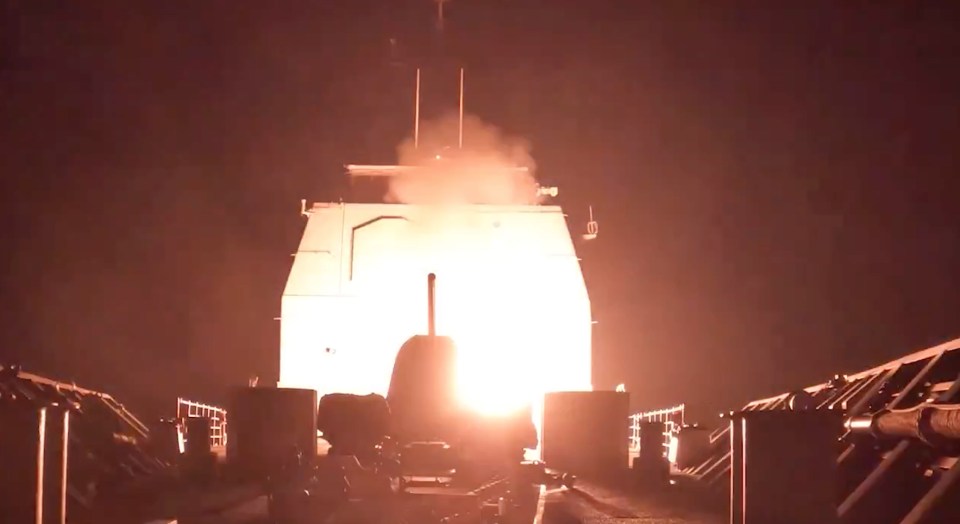 Screen capture of a missile launch at night.