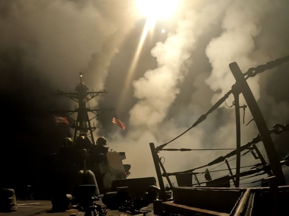 US Navy ship firing missiles in Yemen.