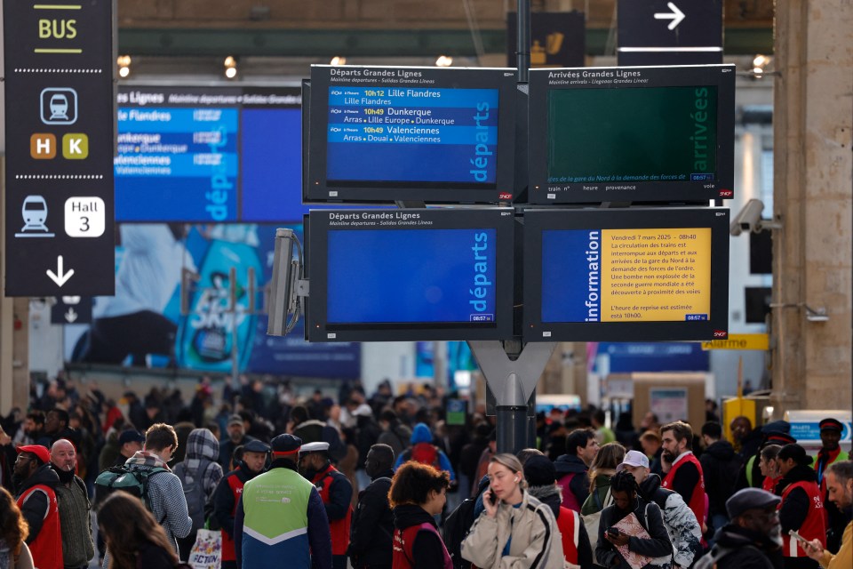 Gare du Nord train station information screens showing service disruptions due to a World War II bomb.