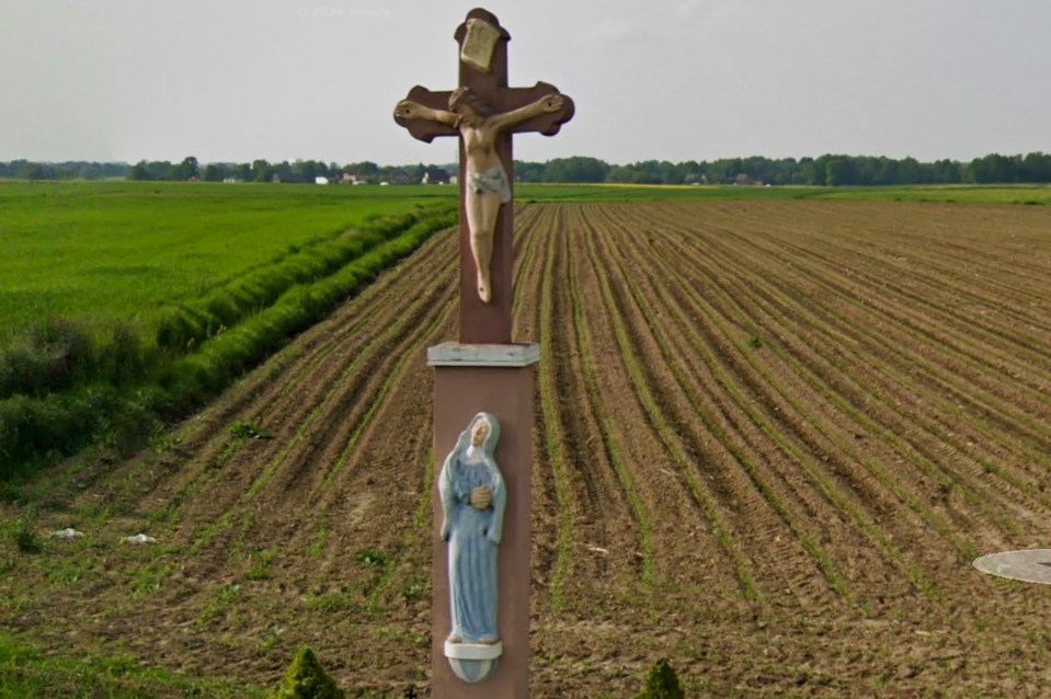 Religious shrine in a field.