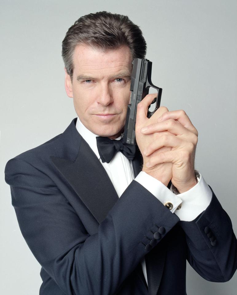 Pierce Brosnan as James Bond holding a gun.
