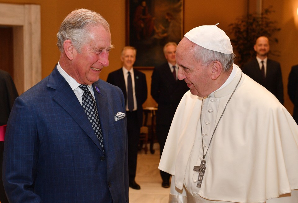 Pope Francis meeting Prince Charles.