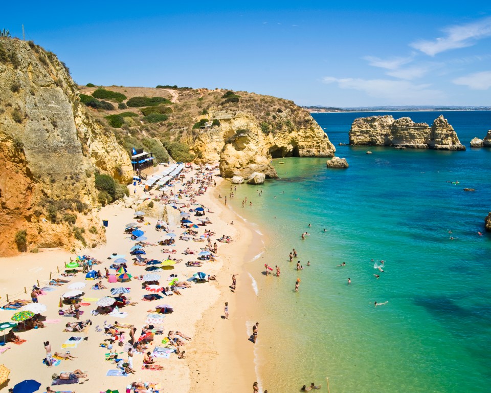 Aerial view of Praia do Camilo beach in Lagos, Algarve, Portugal.
