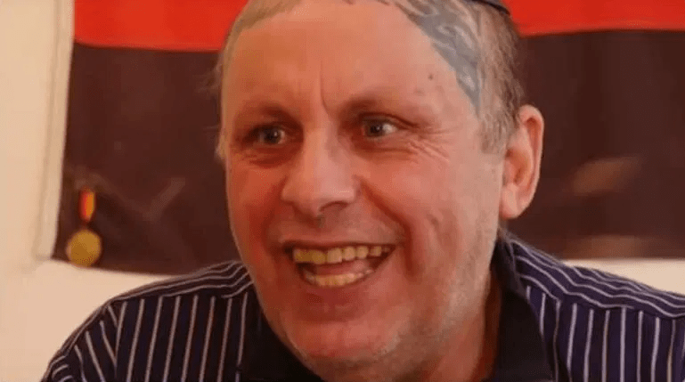 Close-up of Romano Lukas Hitler, convicted of pedophilia.