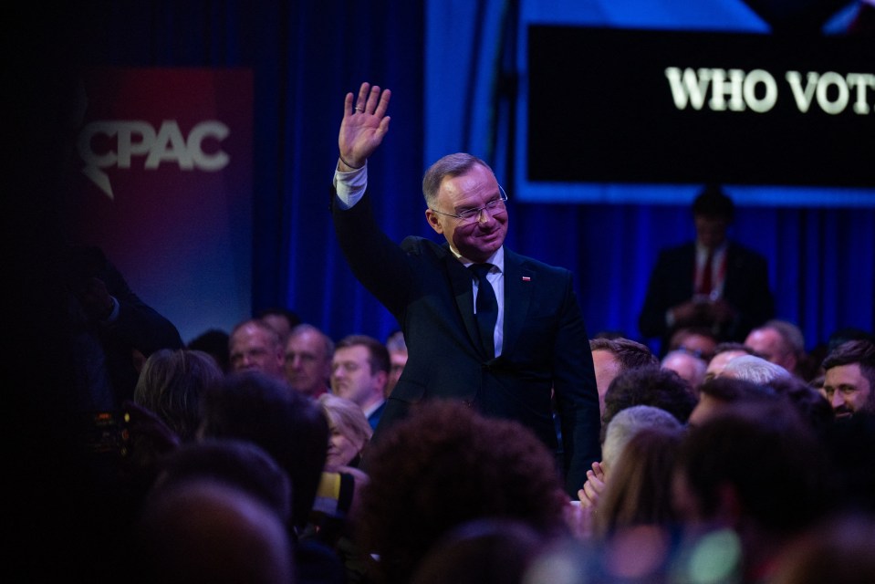 President Andrzej Duda waving to a crowd at CPAC.