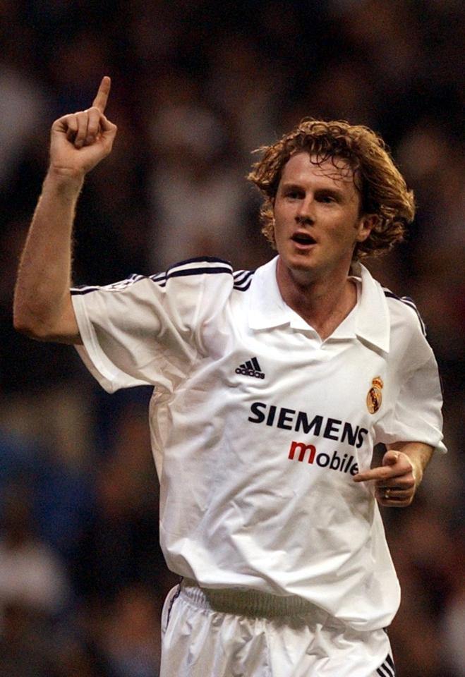 Steve McManaman of Real Madrid celebrating a goal.