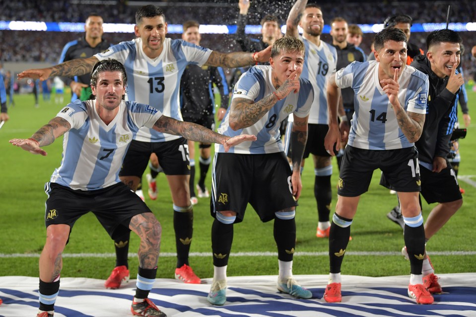 Argentina soccer players celebrating a victory.
