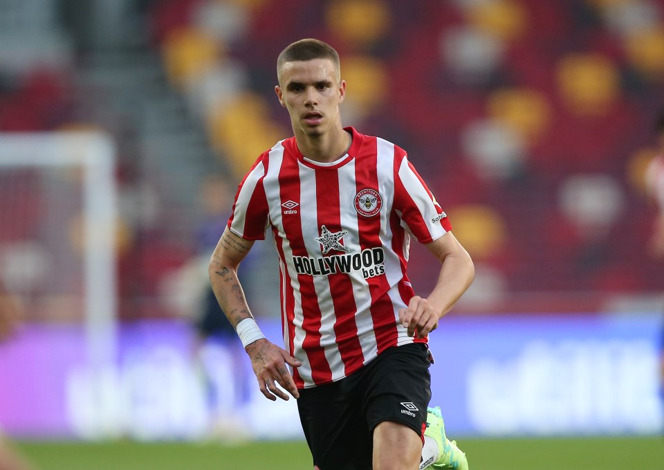Romeo Beckham playing soccer for Brentford B.