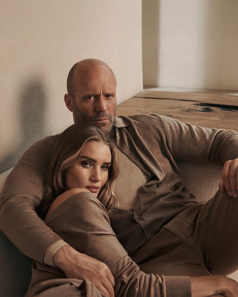 Jason Statham and Rosie Huntington-Whiteley in matching brown outfits.