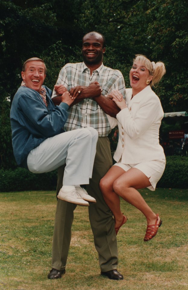 Roy Castle, Kriss Akabusi, and Cheryl Baker on the set of BBC's Record Breakers.