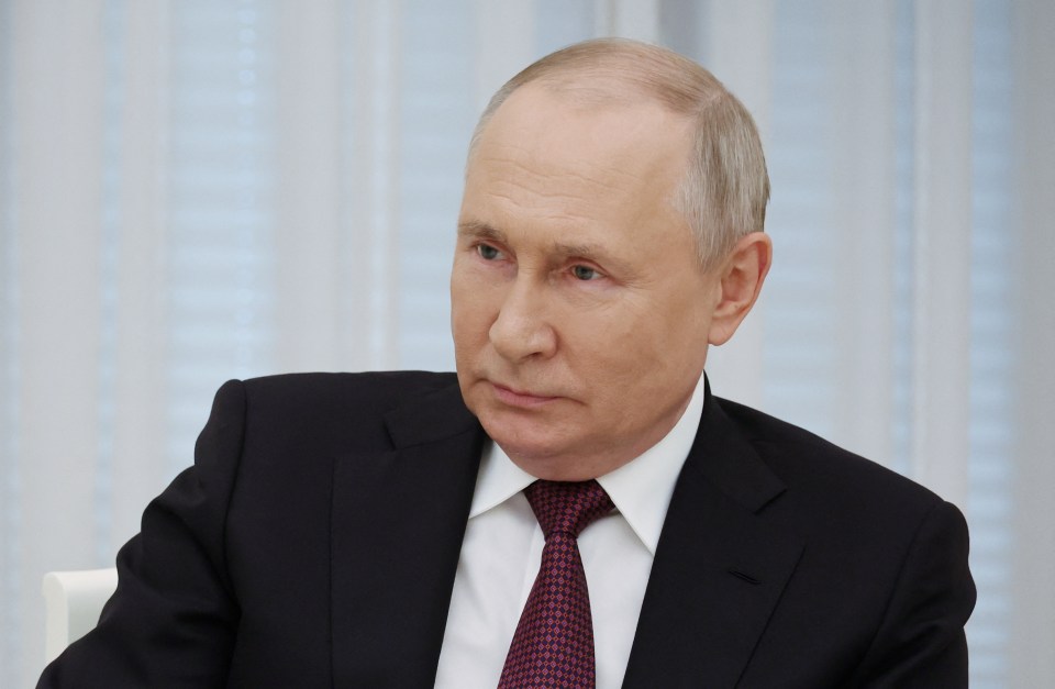 Vladimir Putin at a meeting.