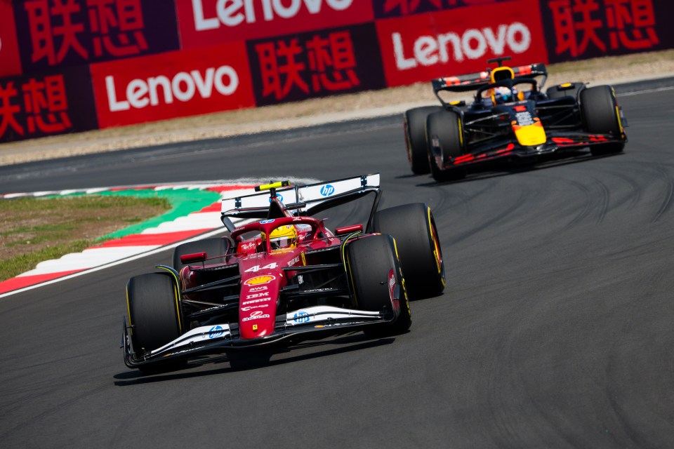 Formula 1 race cars on a track.