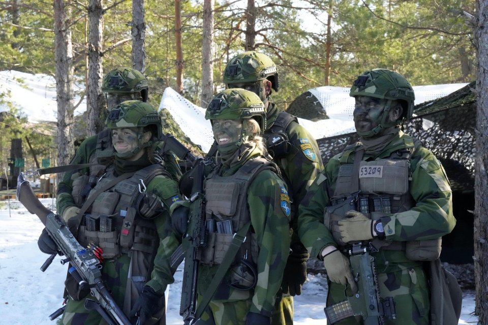 Swedish army troops participating in a NATO multinational brigade military exercise.