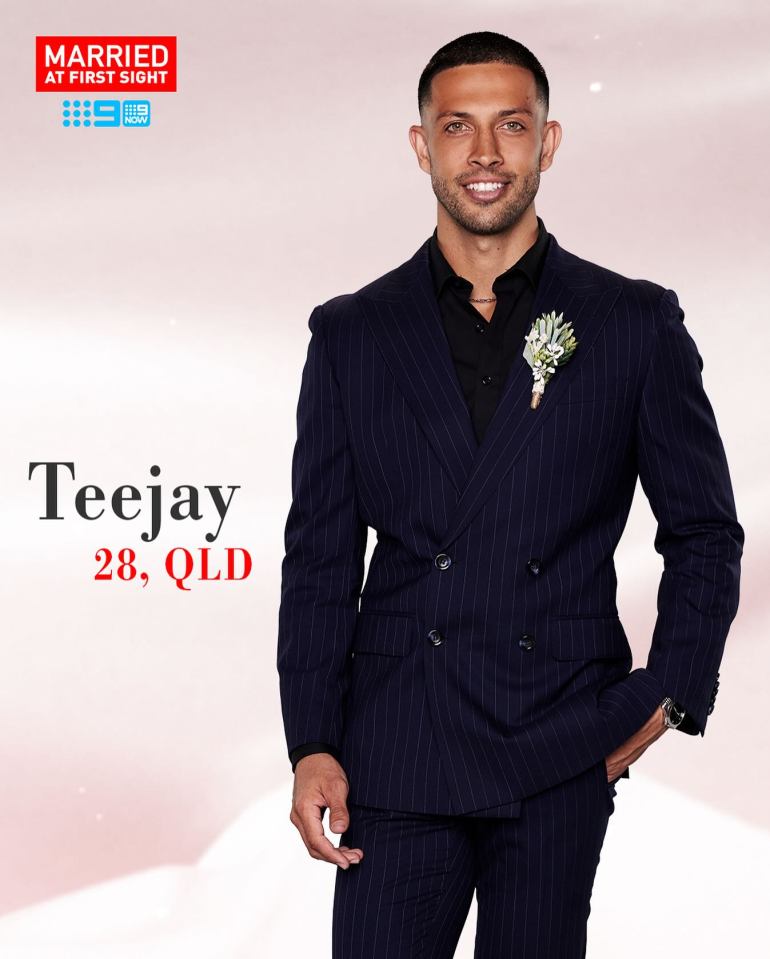 Teejay, 28, from QLD, in a suit.