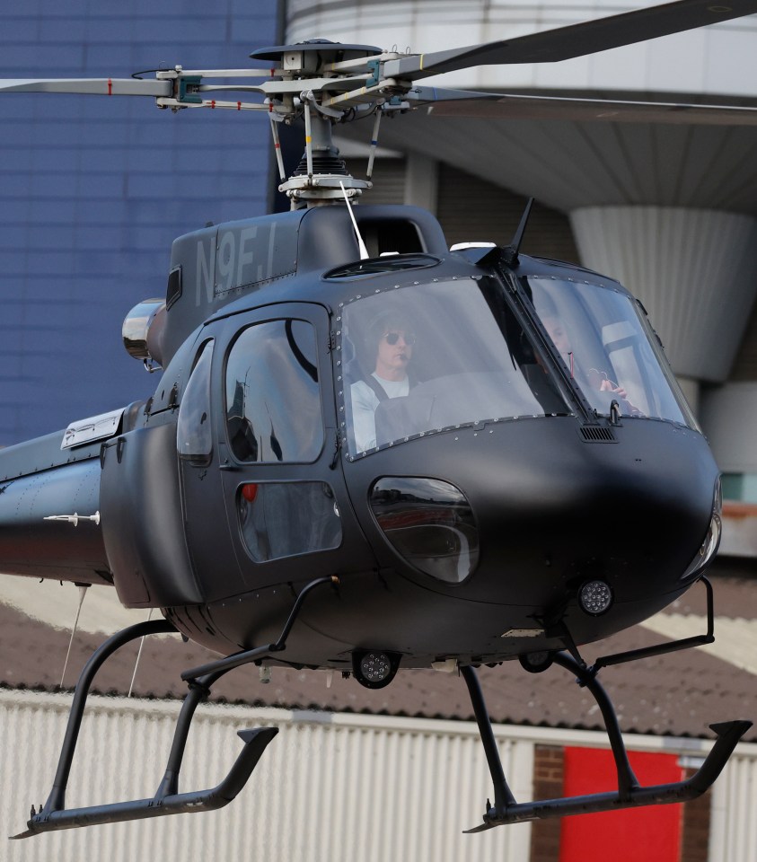 Tom Cruise in a black helicopter.