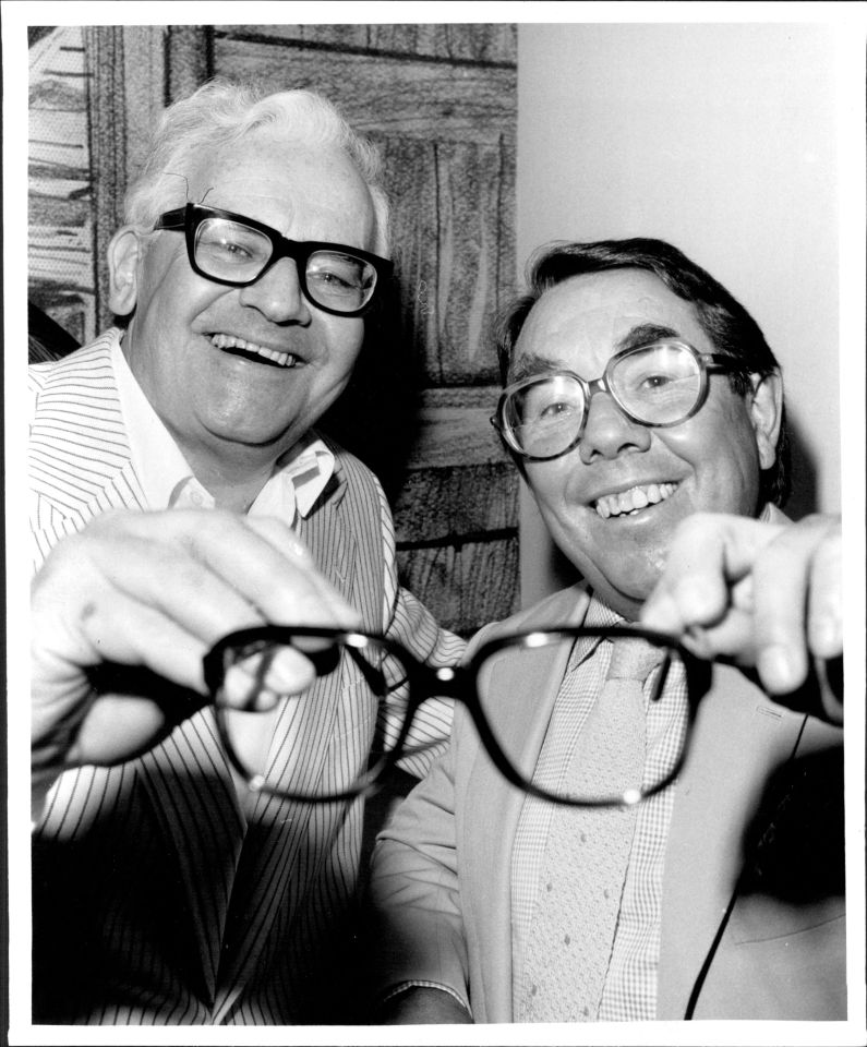 Black and white photo of Ronnie Barker and Ronnie Corbett at a press conference.