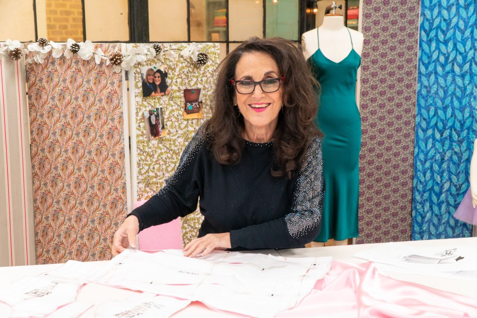 Lesley Joseph working with sewing patterns.