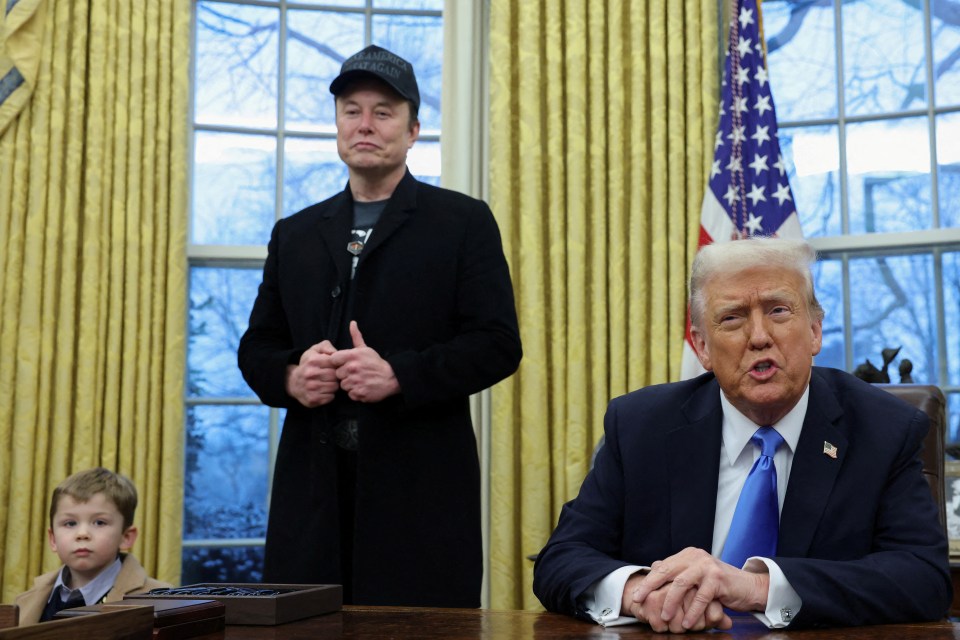 President Trump speaking with Elon Musk and his son in the Oval Office.