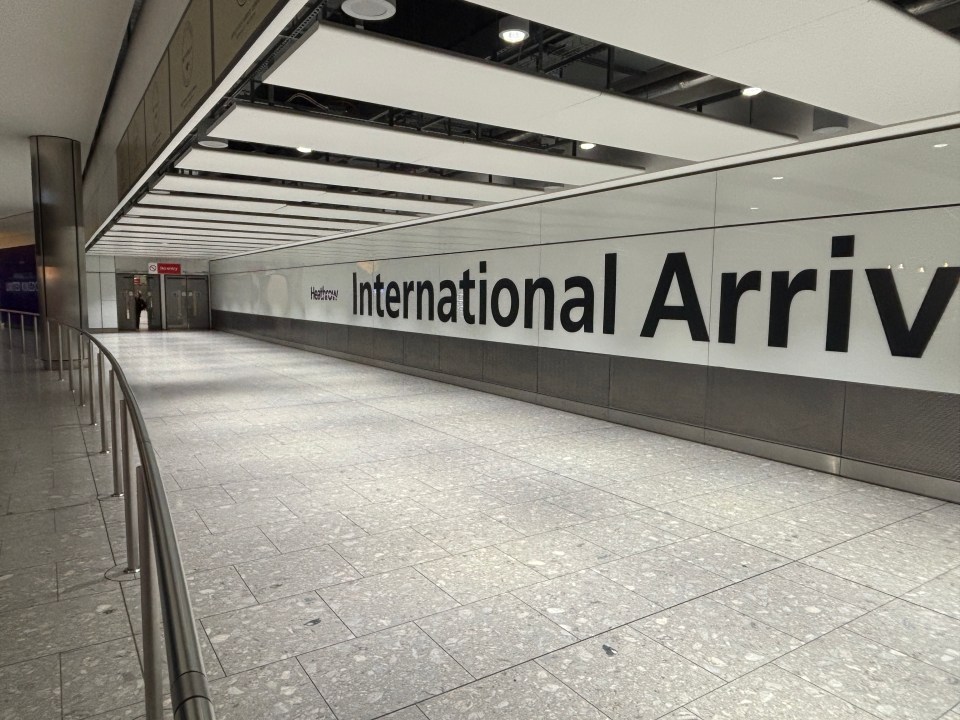 Heathrow Airport International Arrivals sign.