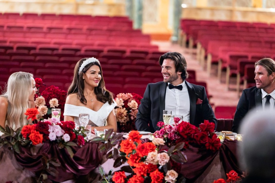 Wedding guests seated at a table.