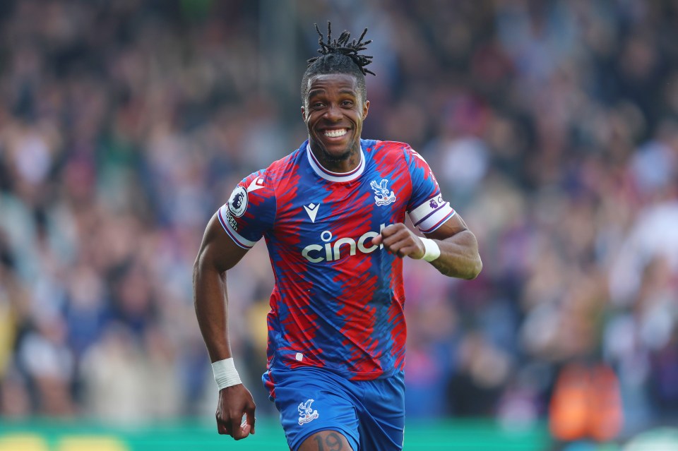 Wilfried Zaha of Crystal Palace celebrating a goal.
