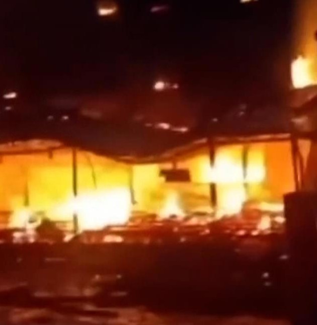 Hotel engulfed in flames.