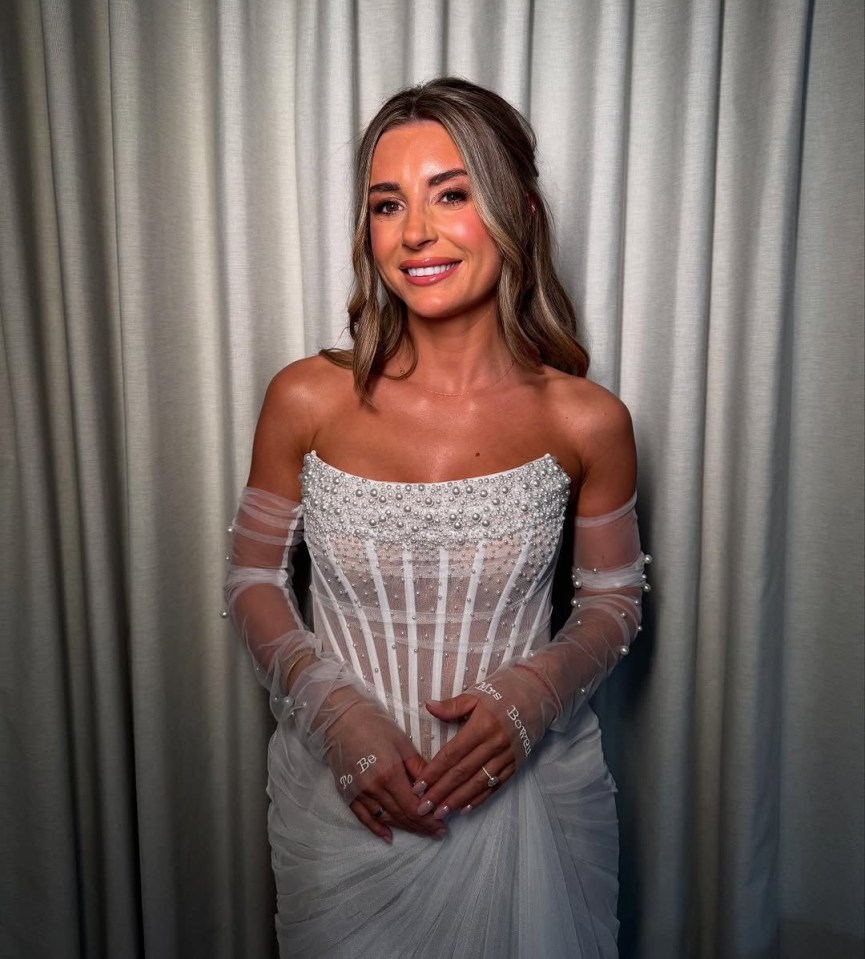 Dani Dyer at her hen do, wearing a white beaded corset gown.