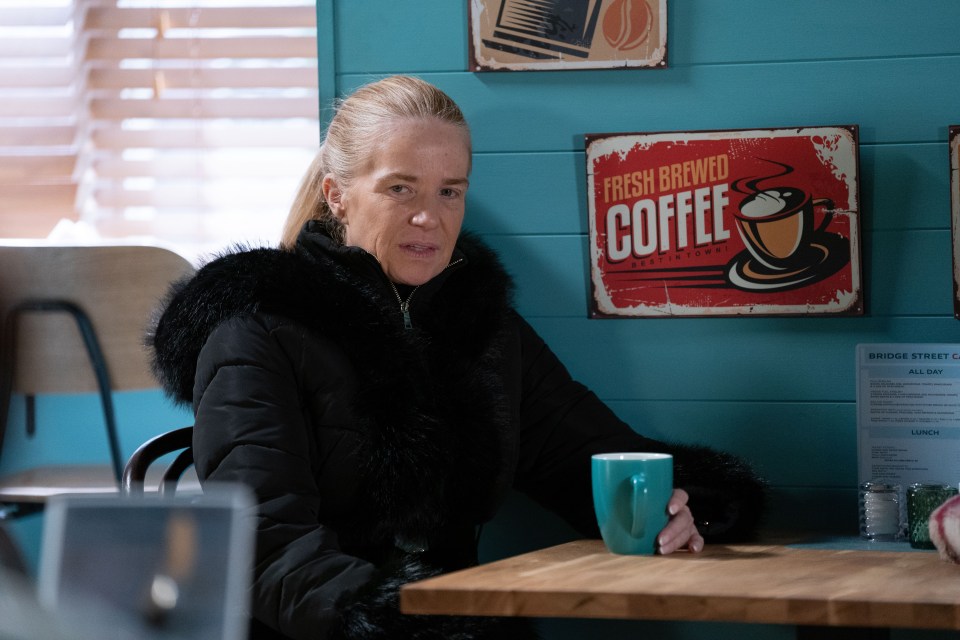 Patsy Palmer as Bianca Jackson in EastEnders, sitting at a cafe table.