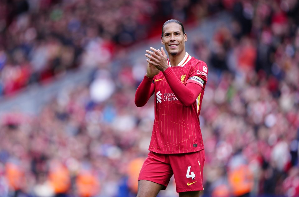 Liverpool captain Virgil van Dijk applauding.