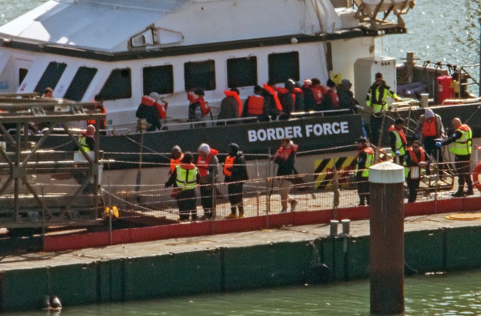 Migrants arriving at Dover Docks, Kent, UK, assisted by Border Force.