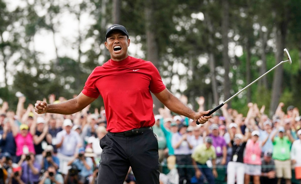 Tiger Woods celebrating a golf victory.