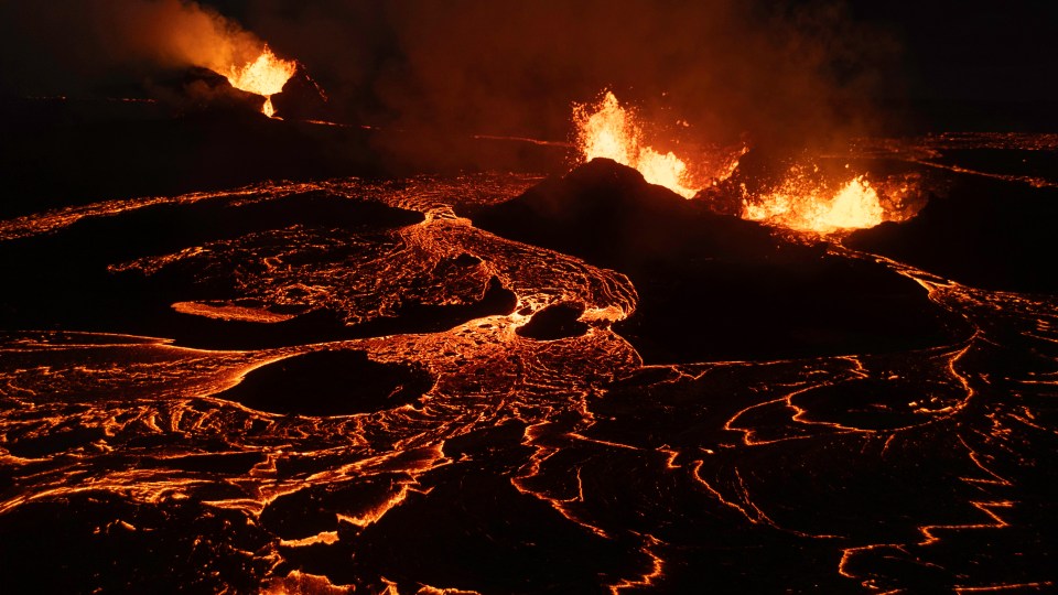 Aerial view of lava flowing from multiple craters of the Sundhnúkur volcano in Iceland.