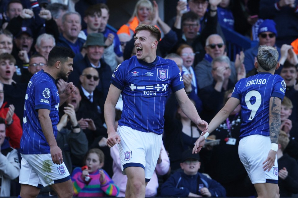 Liam Delap of Ipswich Town celebrates a goal with a teammate.
