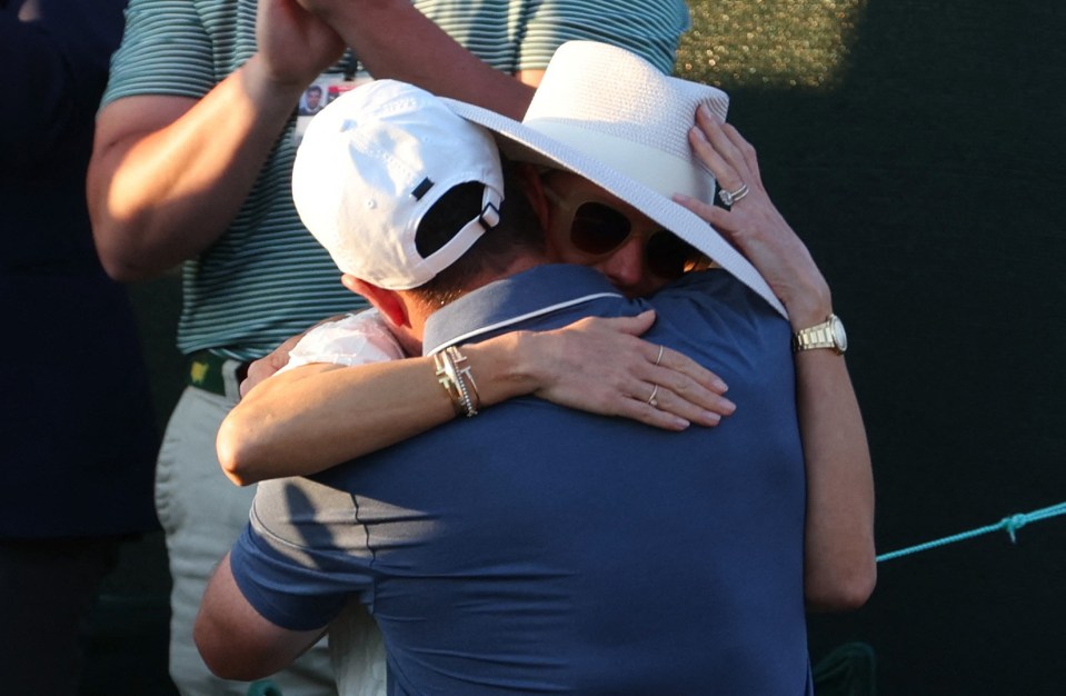 Rory McIlroy embracing his wife after winning The Masters.
