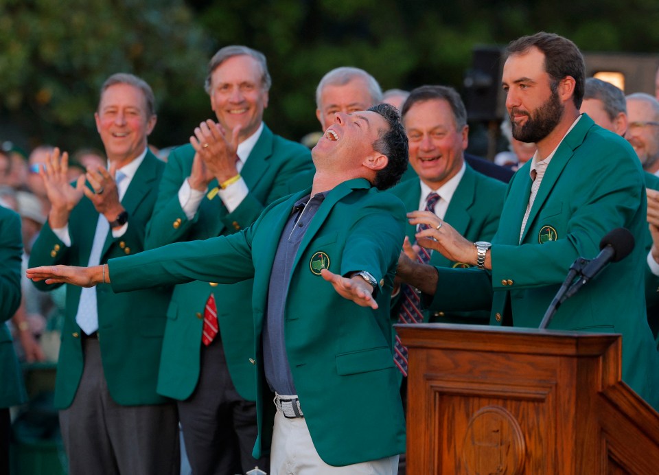 Rory McIlroy, wearing a green jacket, celebrates winning The Masters.