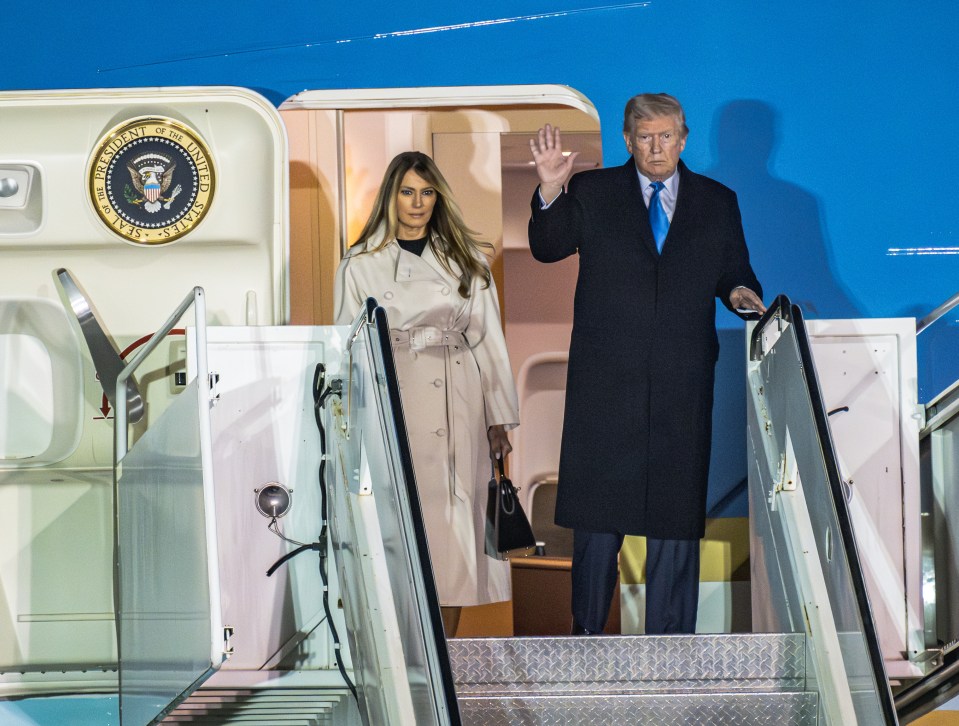 President Trump and Melania Trump disembarking Air Force One.