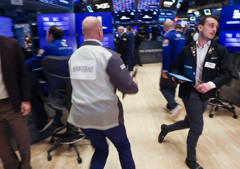 Traders on the floor of the New York Stock Exchange.