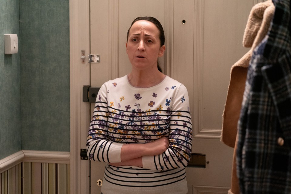 Sonia Fowler from EastEnders with arms crossed.