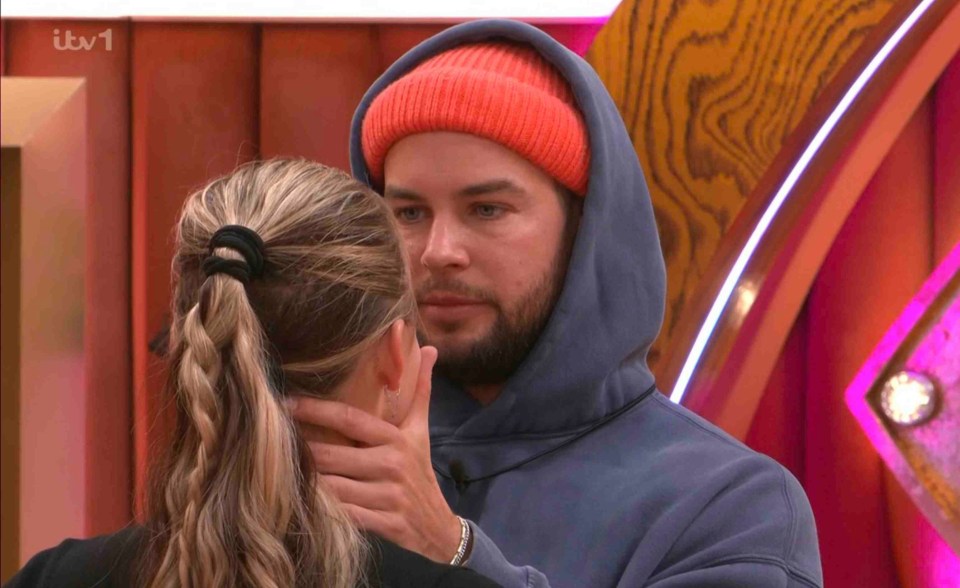A man and a woman embracing.