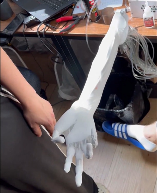 A robotic arm twitching and moving.