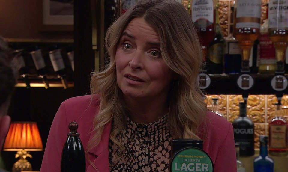 Charity Dingle speaking to Jacob Gallagher in a pub.
