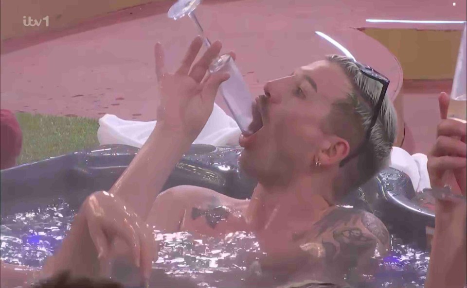 Contestants in a hot tub splashing water.