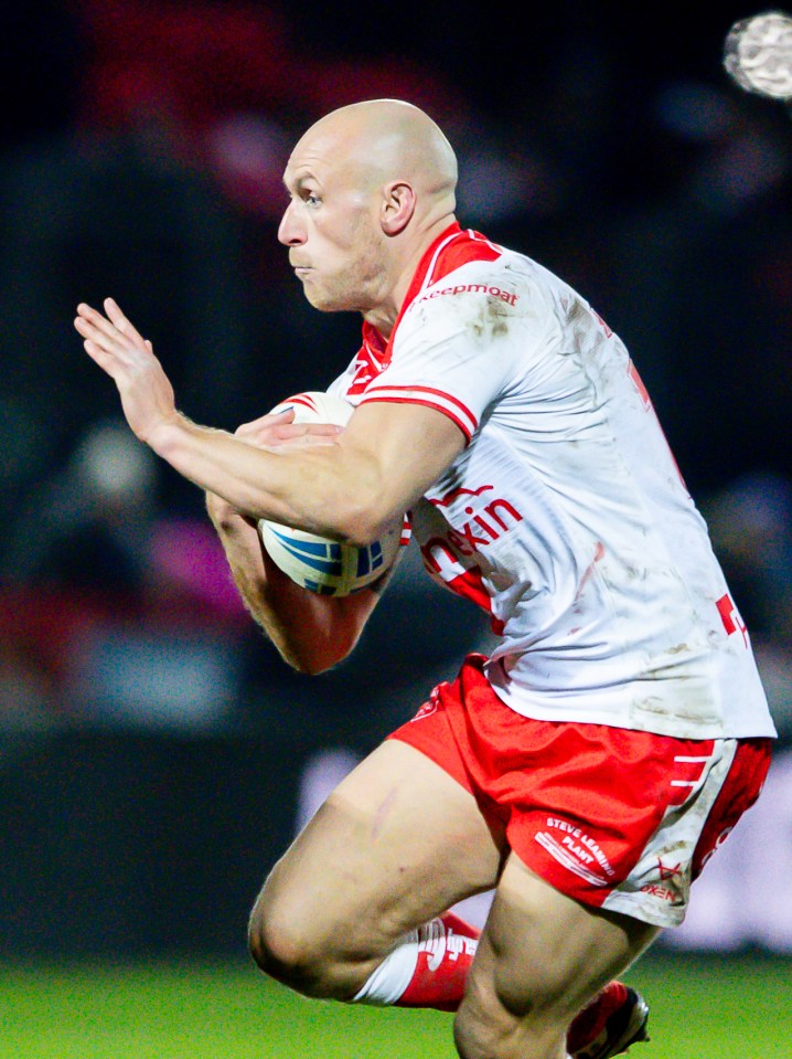 Rugby player catching the ball.